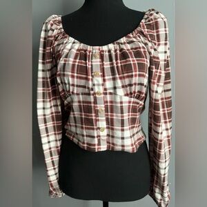 Santory Size Large. Off the shoulder shirt that shows stomach.